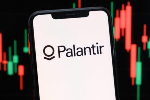 Paris, France - September 4, 2026 : Palantir logo displayed on a smartphone screen with stock market charts.