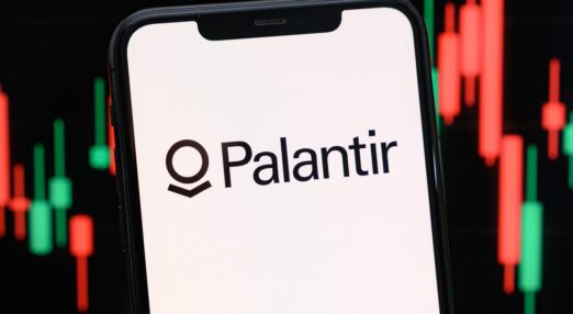 An image of a mobile phone showing the Palantir logo